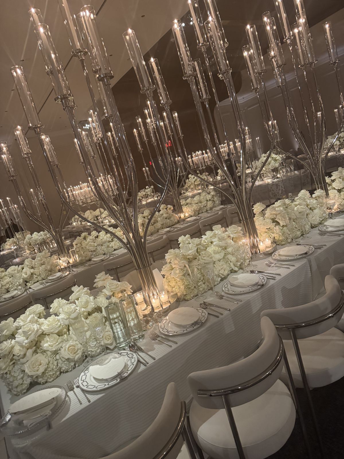 A row of candelabras down a banquet table