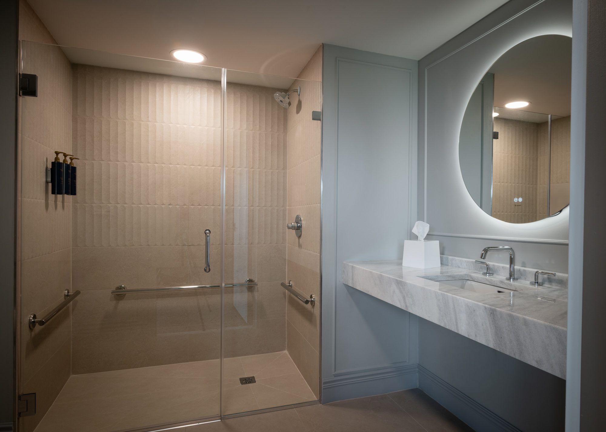 The king suite bathroom with a roll-in shower
